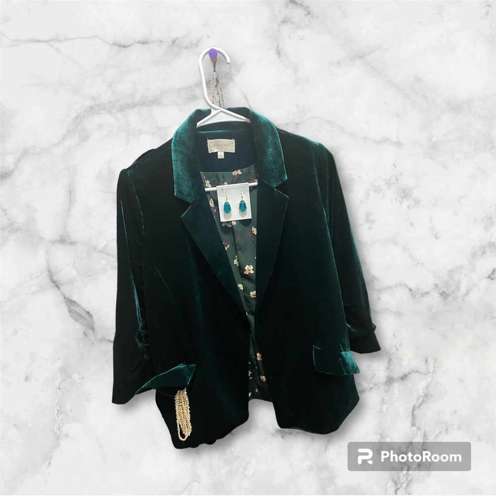 Skies are blue emerald green velvet blazer.